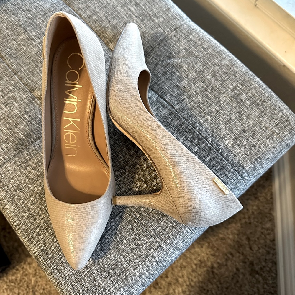 Calvin Klein cream high heels in size 8 M.